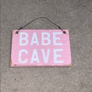 babe cave pink sign